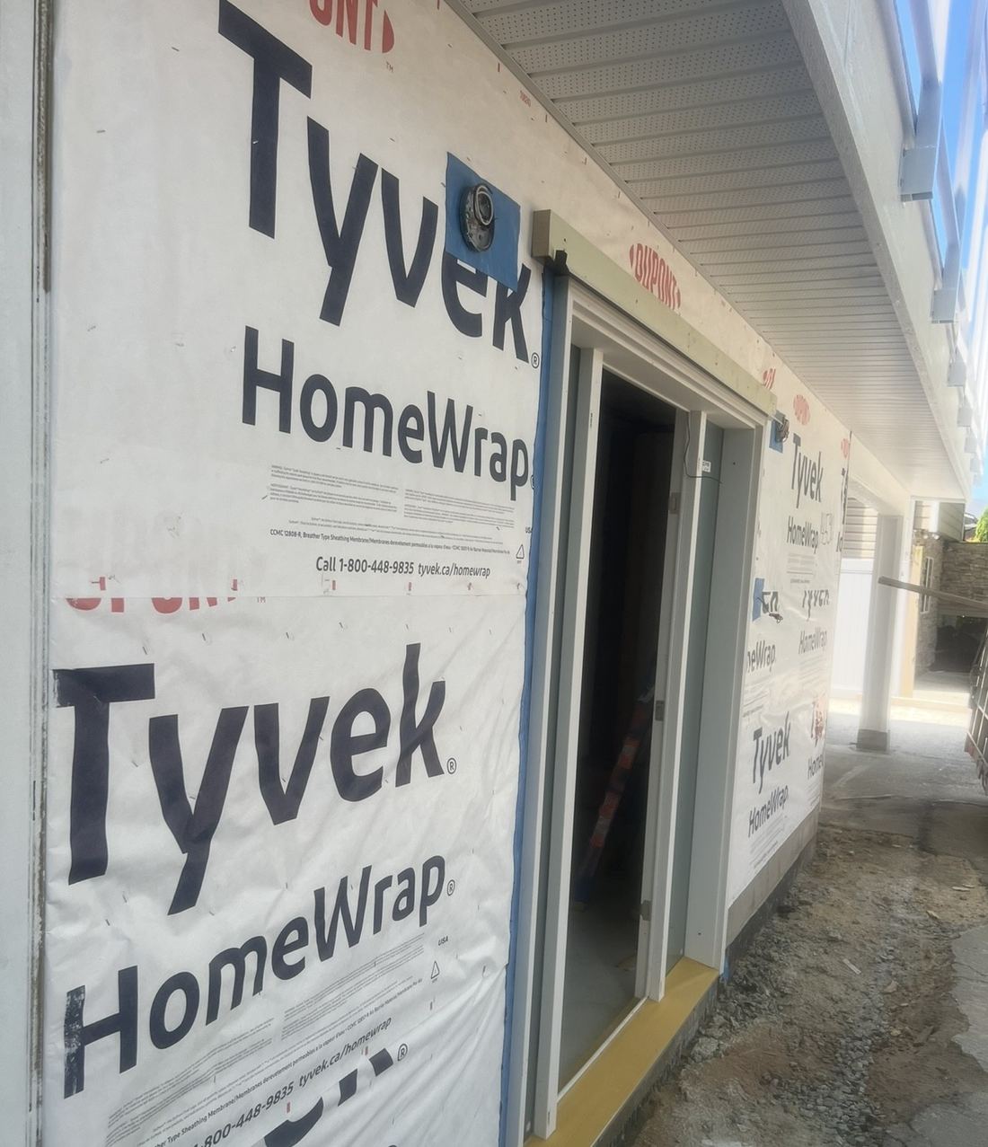 Weather-resistant barrier installed on exterior wall sheathing