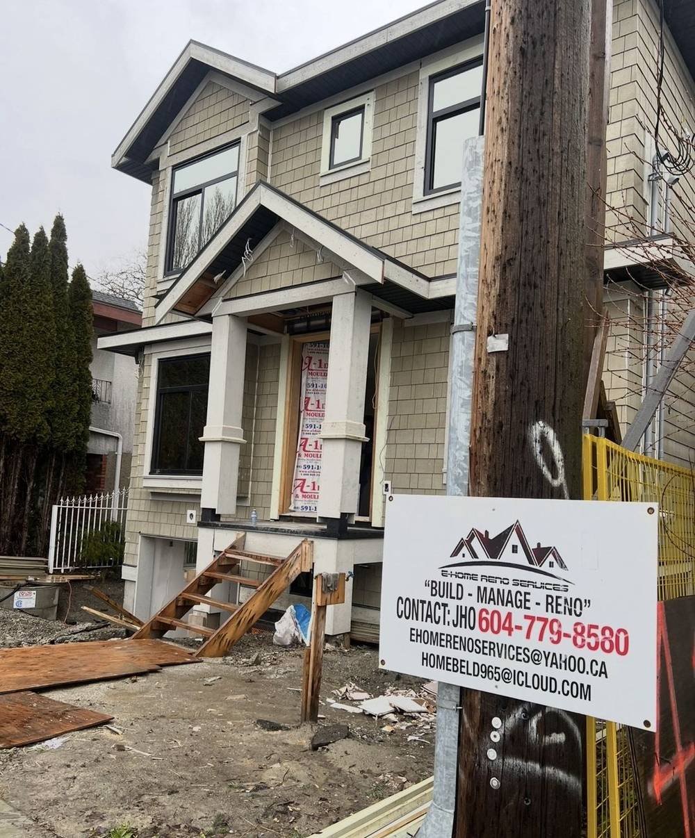 Ehome Reno Services job site sign posted outside a home under construction